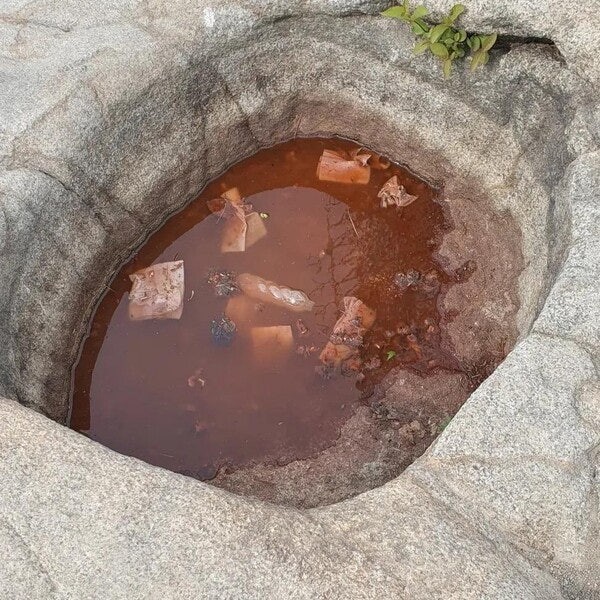 A pool in the Gamrocheon Ecological Park area at Mount Gwanak damaged by ramen broth and trash