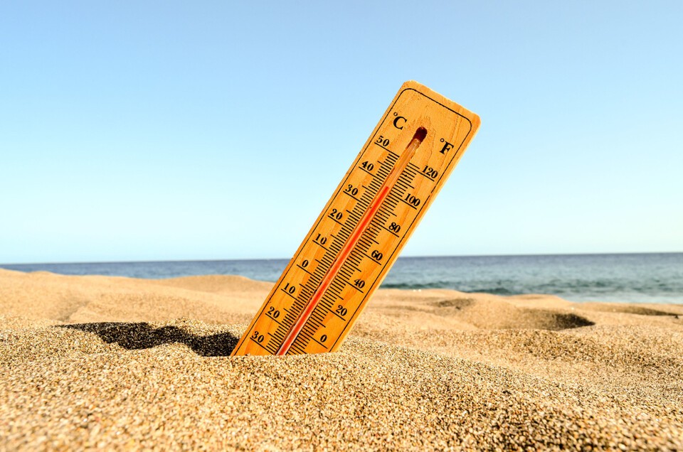 A thermometer placed on a beach in various parts of Europe shows temperatures nearing 40 degrees Celsius as the heatwave continues.