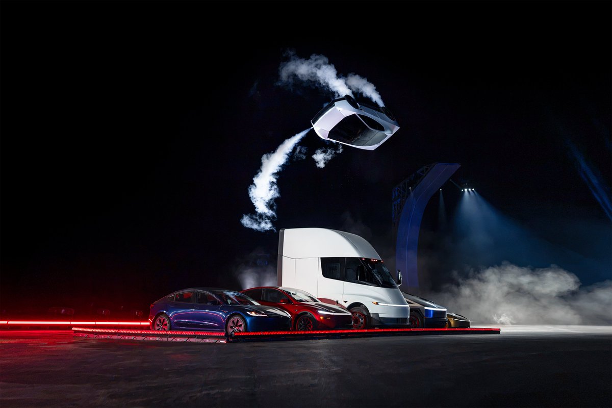 テスラ・ロードスターが圧縮空気スラスターを作動させ、セミトラックやサイバートラックなどテスラ車の上を空中で回転しながら飛び越えている。(写真=テスラ)